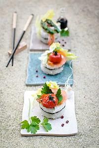 three sushi with tomato toppings thumbnail