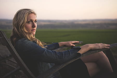 man sitting on chair looking on side thumbnail