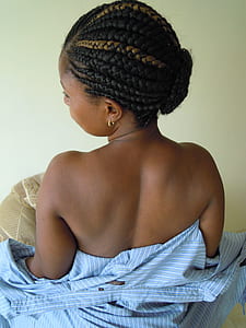 woman in blue top posing for picture thumbnail