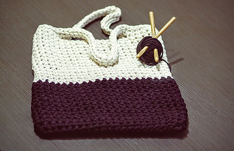 white and black knit bag thumbnail