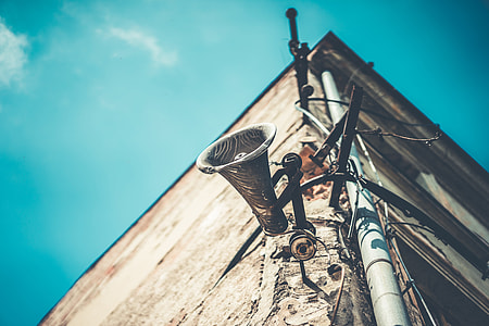 Old Loudspeaker Megaphone on Abandoned House thumbnail
