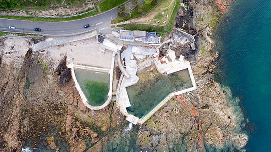 aerial photography of white concrete building thumbnail