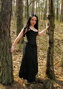 woman in black spaghetti strap maxi dress thumbnail