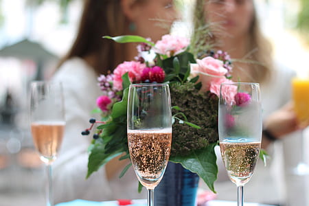 two clear champagne flutes thumbnail