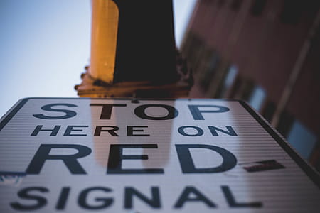 Worm's-eye View Photography Of Stop Signage thumbnail