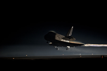 white NASA plane on runway thumbnail