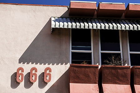 666 signage near window thumbnail