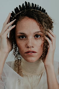 woman wearing white top thumbnail