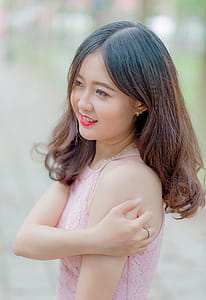 Woman Wearing Pink Tank Top thumbnail