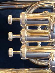 brass-colored wind instrument mouthpiece thumbnail