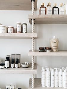 assorted color containers on top of shelves thumbnail