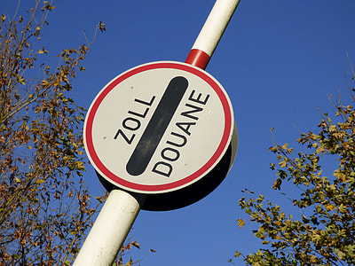 low angle photo of zoll douane road sign thumbnail