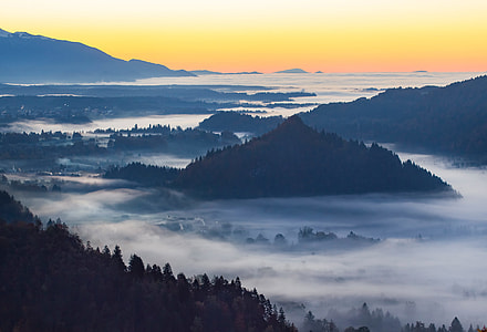 mountains near body of water thumbnail