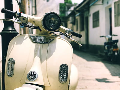 closeup photography of white motor scooter thumbnail