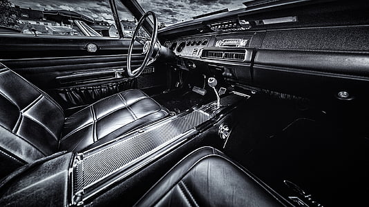 grayscale photography of classic vehicle interior thumbnail