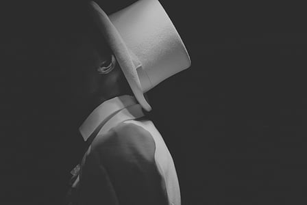 grayscale photo of man wearing fedora hat thumbnail
