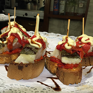 four bread dishes on white surface thumbnail