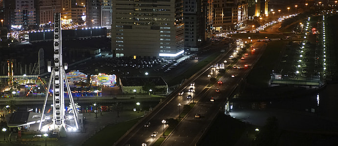  Eye of the Emirates and the Al Qasba Canal by night in Sharjah, United Arab Emirates thumbnail