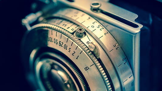 macro photography of gray and black camera thumbnail