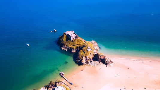 bird's eye photography of stone castle on mountain thumbnail