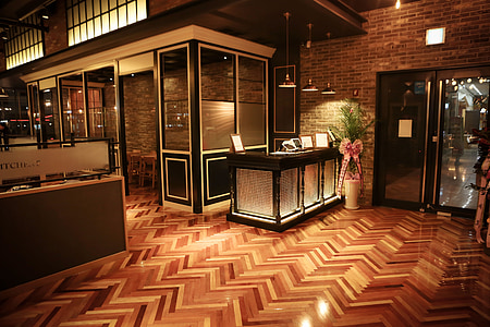 brown wooden bar table beside door thumbnail
