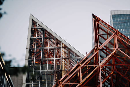 low-angle photography of high-rise building at daytime thumbnail