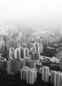 grayscale and aerial view photography of city buildings thumbnail