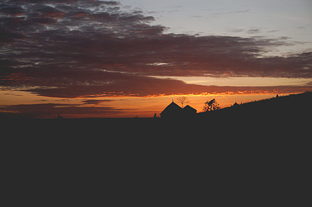 silhouette of house during sun set thumbnail