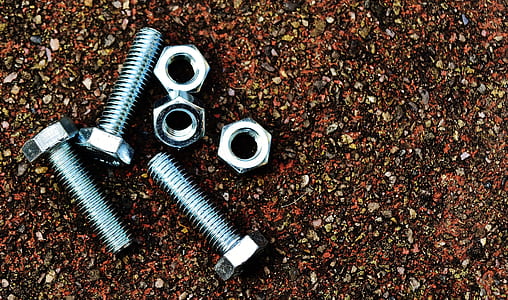 three gray bolts and nuts photo thumbnail