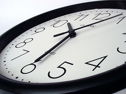 round black analog clock displaying 10:30 thumbnail