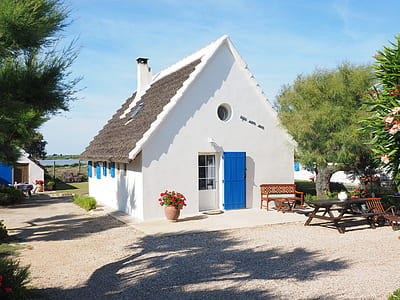 White and Brown Residential House during Daytime thumbnail