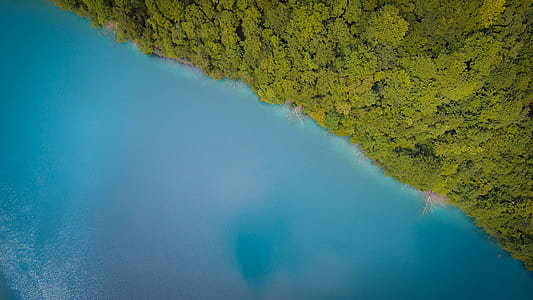 aerial shot of green island thumbnail