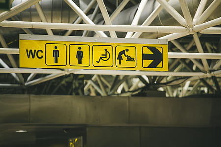 selective focus photography of yellow and black signage thumbnail