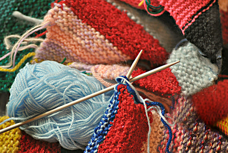 close view of knitting needles and yarns thumbnail