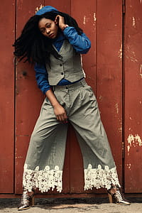 Woman Wearing Gray Waist Vest and Gray Flare Pants thumbnail