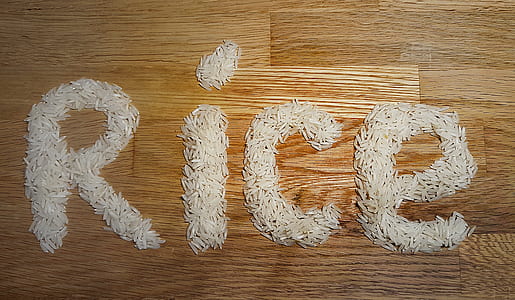 white rice grains in rice text on brown surface thumbnail