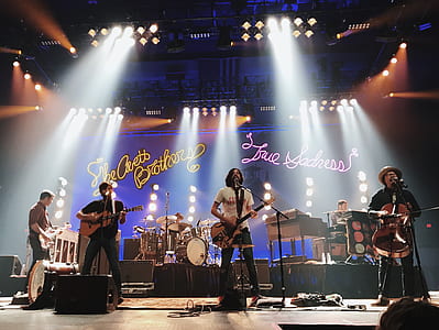 music band performing on stage thumbnail