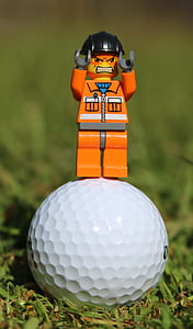 mini figure on golf ball thumbnail