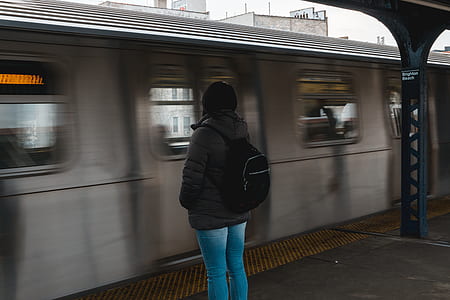 Photo of Woman Waiting at the Train Station thumbnail