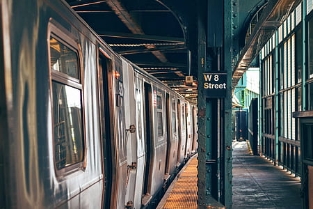 train on station with W8 street sign thumbnail