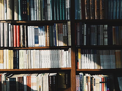 photography of brown wooden book shelf thumbnail