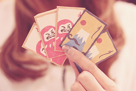 macro shot photography of five playing cards thumbnail
