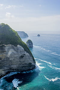 Rock Formation Near Body Of Water thumbnail