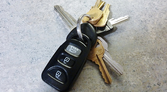 silver keys and black car key fob thumbnail
