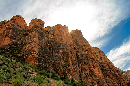 rock formation under white clouds thumbnail