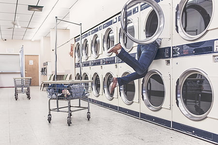 photo of person getting something inside dryer thumbnail