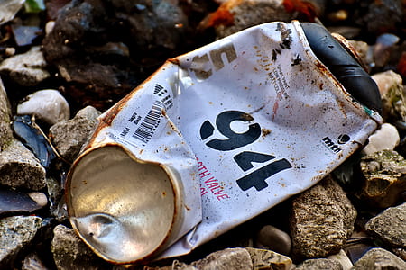 dented easy-open can on stones thumbnail
