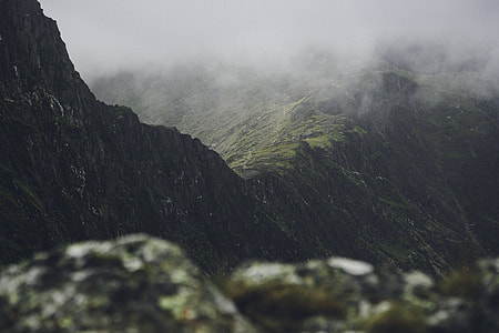 green mountain covered with fogs thumbnail