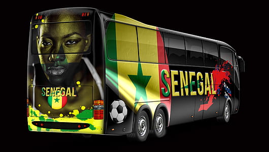 yellow and black Senagal bus with black background thumbnail
