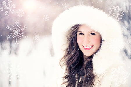 woman wearing white hooded coat facing camera thumbnail